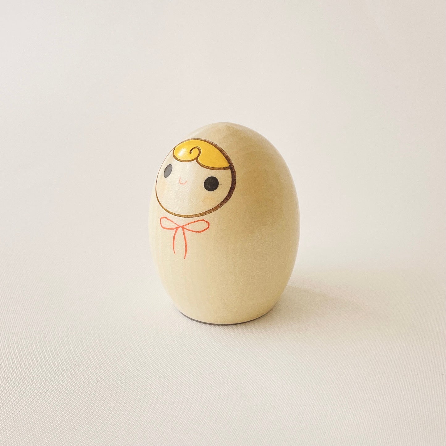 へその緒入こけし 赤リボン