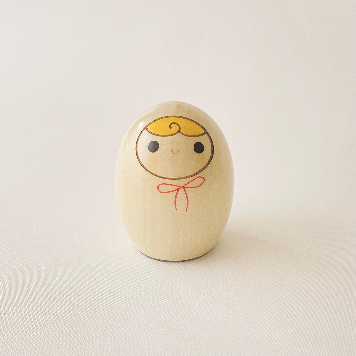 へその緒入こけし 赤リボン
