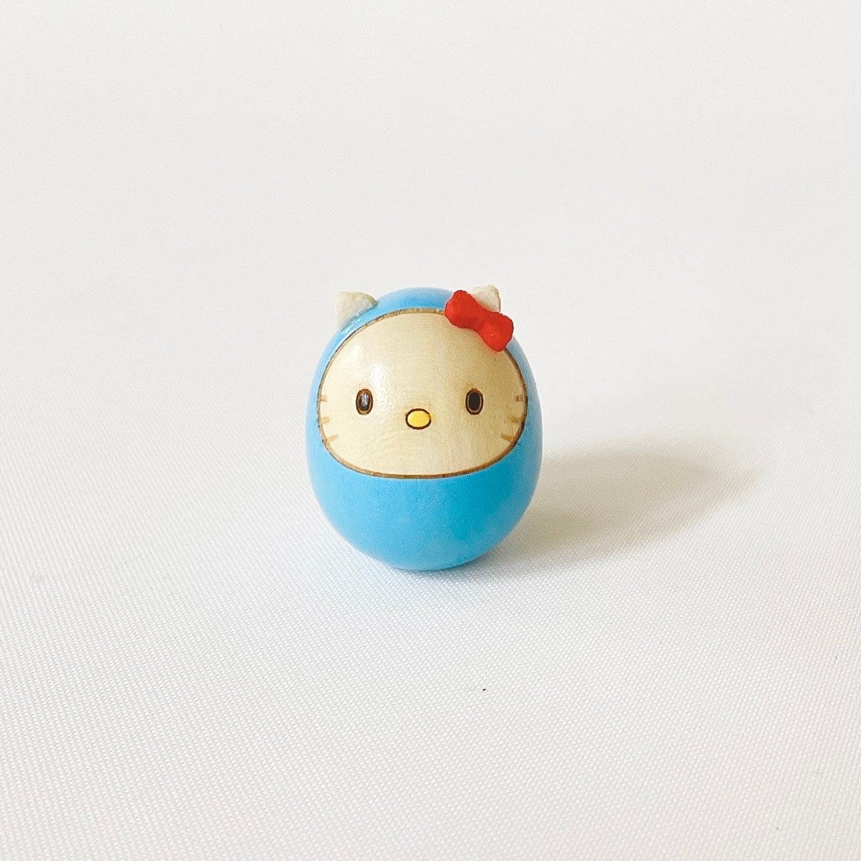 ハローキティ 豆ダルマ 水色