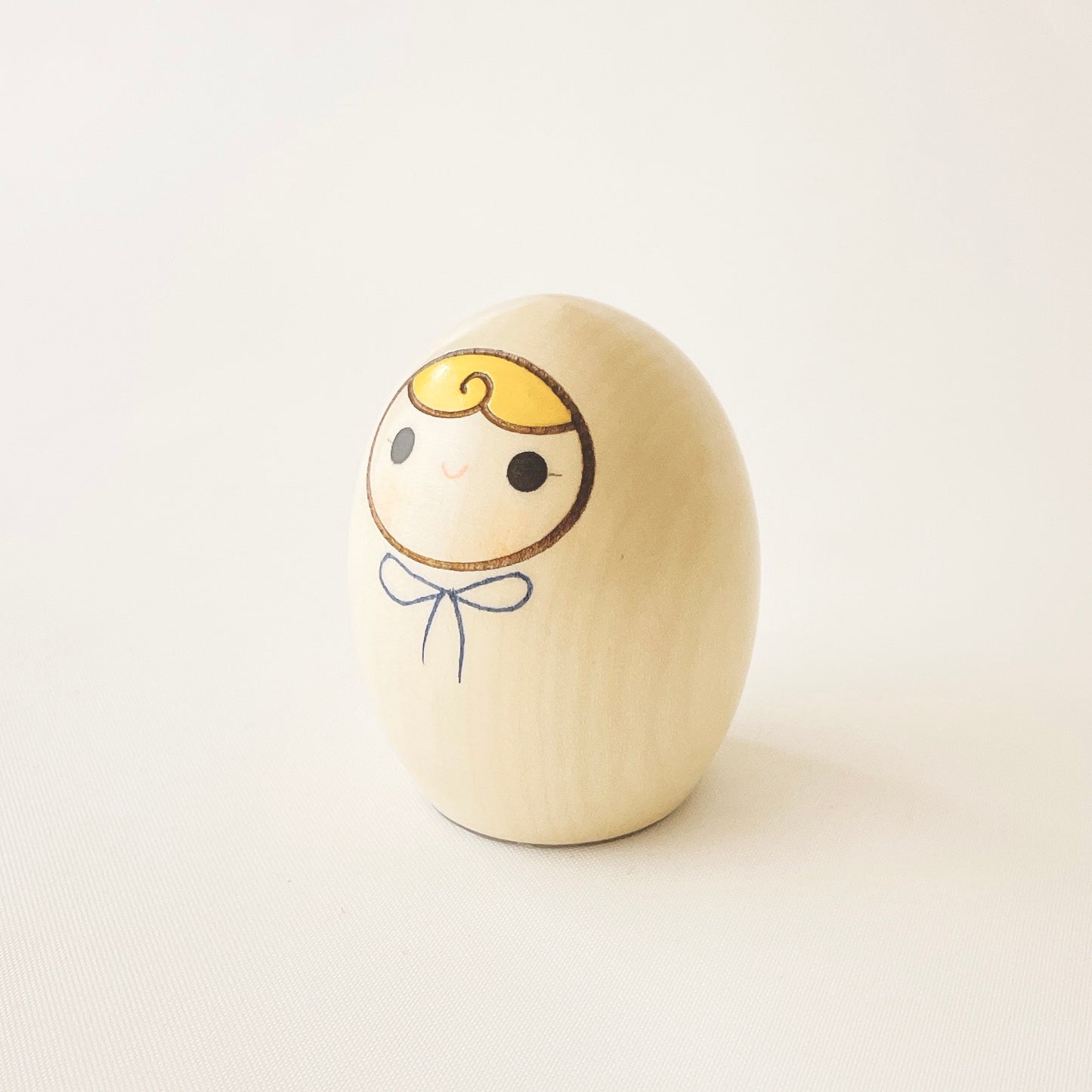 へその緒入こけし 青リボン