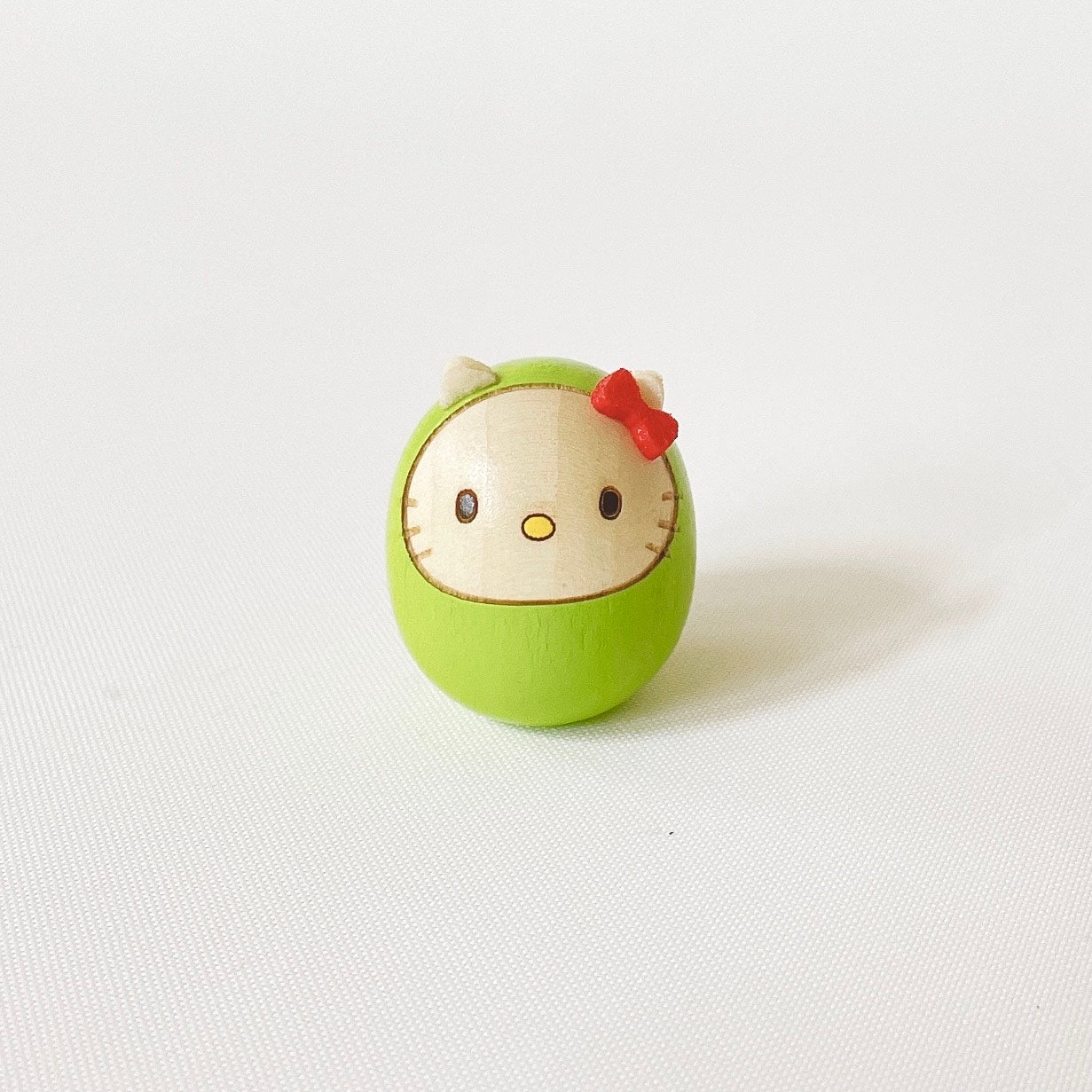 ハローキティ 豆ダルマ 黄緑